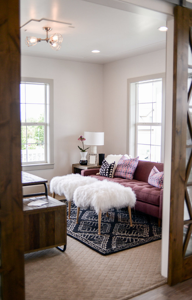 Home Office. The barn doors open to a cozy home office. Lighting is Scout 3 Light Adjustable Semi-Flush. #homeoffice #lighting Millhaven Homes