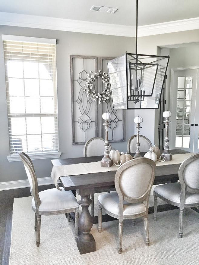 Farmhouse dining room. As you enter in to the home the formal dining is the first room you notice. We decided to add double crown molding in the formal dining and paint the walls a darker color to make it feel more formal. Farmhouse lighting Lighting is Quorum International Kaufmann Oiled Bronze. #Farmhousediningroom #Farmhouse #diningroom #doublecrownmolding #formaldiningroom Beautiful Homes of Instagram ceshome6