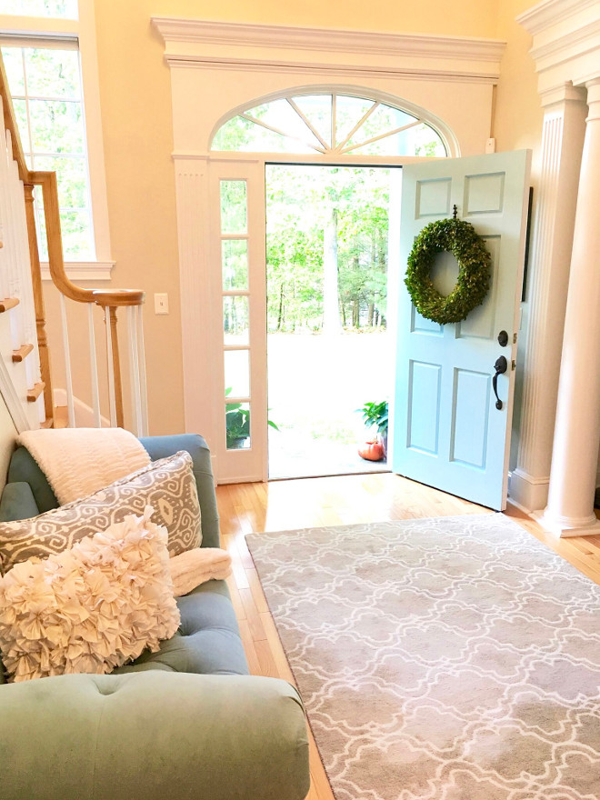 Blue front door. A blue front door opens to a bright, two-storey foyer. Blue door front door paint color is Benjamin Moore 723 Spring Rain. #BenjaminMoore723SpringRain #BenjaminMoore723 #BenjaminMooreSpringRain #Bluedoor #bluefrontdoor Beautiful Homes of Instagram peonypartydesigns