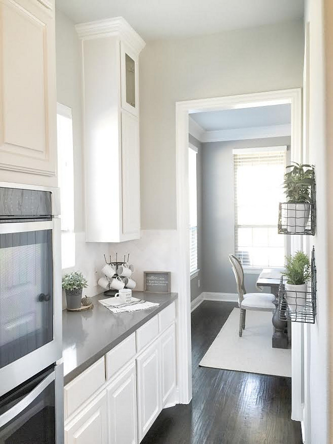 White cabinet against very dark hardwood floors. Floors are 2 1/2 red oak planks hand-scraped lightly with the grain and stained Espresso twice. #verydarkhardwoodfloors #hardwoodfloorstaincolor #darkfloorstaincolor #floorcolor Beautiful Homes of Instagram ceshome6 