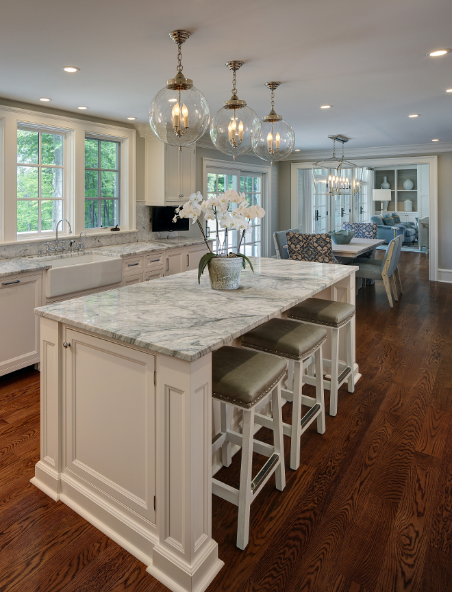 Kitchen stools. Kitchen counterstools. The kitchen island feature pewter leather counterstools with brushed nickel nailheads. #kitchen #counterstools #barstools W Design