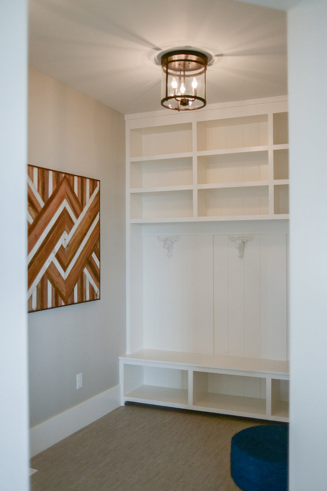 Mudroom Hooks. This mudroom features plenty of storage and some fun hooks! #mudroom #mudroomhooks #hooks Millhaven Homes