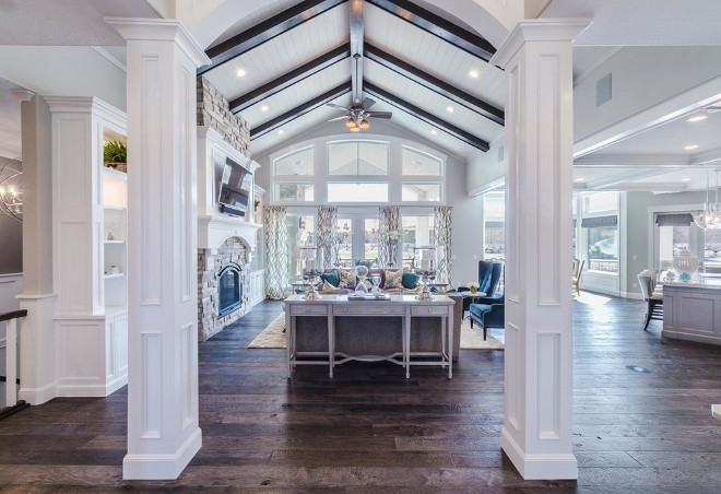 Open concept living room layout flooring and beams. The Floor is a hickory hardwood. Open concept living room layout flooring and beams. #Openconcept #livingroom #livingroomlayout #flooring #beams #Flooring #hickoryhardwood open-concept-living-room-layout-flooring-and-beams Tree Haven Homes