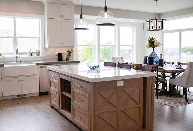 Kitchen layout. The kitchen island faces the dining room, which opens to a large deck. #kitchenlayout #layout #homelayout Millhaven Homes