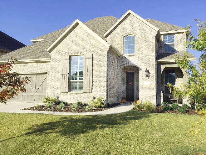 Garage Door & Shutters: This home features Cedar garage doors, cedar shutters and cedar porch posts. Stain Color: Custom Highland Builder Color (RST #55). Beautiful Homes of Instagram ceshome6