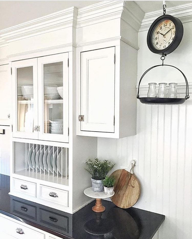 White Farmhouse Paint Color. Behr Swiss Coffee. Behr Swiss Coffee is a great white paint color for farmhouse kitchens. #BehrSwissCoffee #WhiteFarmhousePaintColor #WhiteFarmhouse #PaintColor white-farmhouse-paint-color