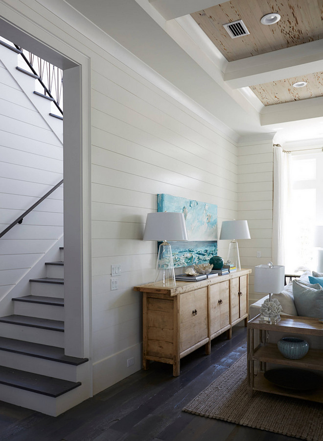 I love the contrast the dark hardwood flooring creates against the white shiplap walls. white-shiplap-walls-with-dark-stained-floors Geoff Chick & Associates