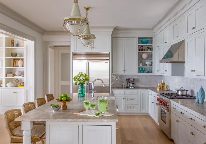 Benjamin Moore Gray Owl Kitchen. This welcoming and approachable kitchen feature flat panel inset door cabinets painted in Benjamin Moore OC-52 Gray Owl. This is really a wonderful grey color for cabinets and I've recommend it to my own clients many times. You really can't go wrong with it! #BenjaminMooreGrayOwlKitchen #BenjaminMooreGrayOwl #Kitchen #BenjaminMooreOC52GrayOwl #BenjaminMooreOC52 #BenjaminMoore #OC52 #GrayOwl #BenjaminMoorePaintColors Main Street Kitchens at Botellos