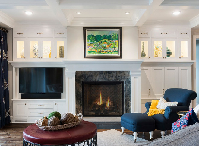 Living room fireplace cabinet. Custom cabinetry flanks the fireplace in this living room. #livingroom #fireplace #cabinet Stonewood LLC. Studio M Interiors. Spacecrafting Photography.