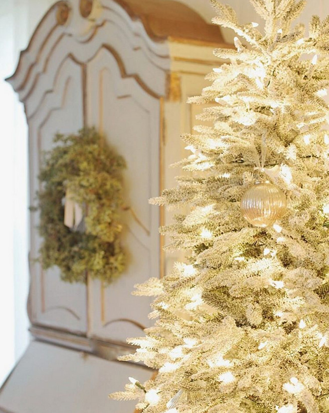 Flocked Christmas Tree with Warm White Light. Flocked Christmas Tree with Warm White Light. Flocked Christmas Tree with Warm White Light #FlockedChristmasTree #WarmWhiteLight French Country Cottage via Instagram @frenchcountrycottage