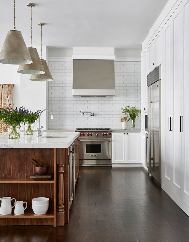 Kitchen Flooring. Kitchen dark stained hardwood floors. Kitchen dark hardwood floors. The floors are walnut, stained in a walnut finish. Satin Poly #kitchen #floors #hardwoodfloors #Darkhardwoodfloors #walnutfloors #stainedinawalnutfinish Satin Poly Chango & Co. Jacob Snavely Photography