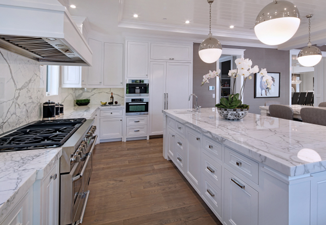 Kitchen Countertop. Backsplash are countertop is Statuario marble slab. Kitchen Countertop. Kitchen Countertop #KitchenCountertop #Kitchen #Countertop #Statuariomarble #marbleslabcountertop Brandon Architects, Inc