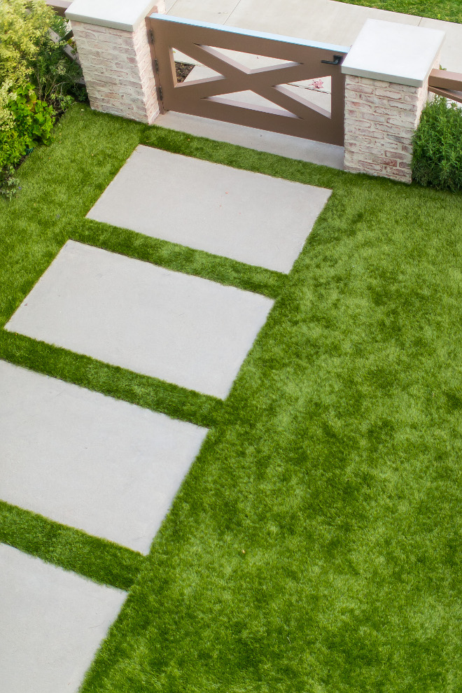 Acid washed concrete pavers. Acid washed concrete pavers create a unique sidewalk entrance to this gorgeous home. #Acidwashedconcretepavers #concretepavers Patterson Custom Homes