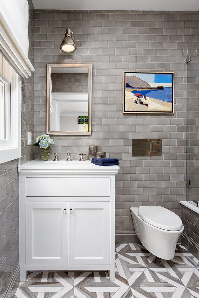 Bathroom renovation with grey subway tile. The tile installed in this bath was Sonoma Tilemaker's Stellar Collection and the color is Quicksilver Grey. Bathroom renovation with grey subway tile. Bathroom reno with grey subway tile #Bathroomrenovation #greysubwaytile #subwaytile Robert Frank Interiors