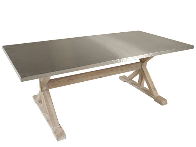 Dining Table: Bernhardt Interiors Quentin Dining Table - $$ - Hand-hammered stainless steel top. - Solid mindi wood base with trestle-style stretcher in a sandblasted driftwood finish.