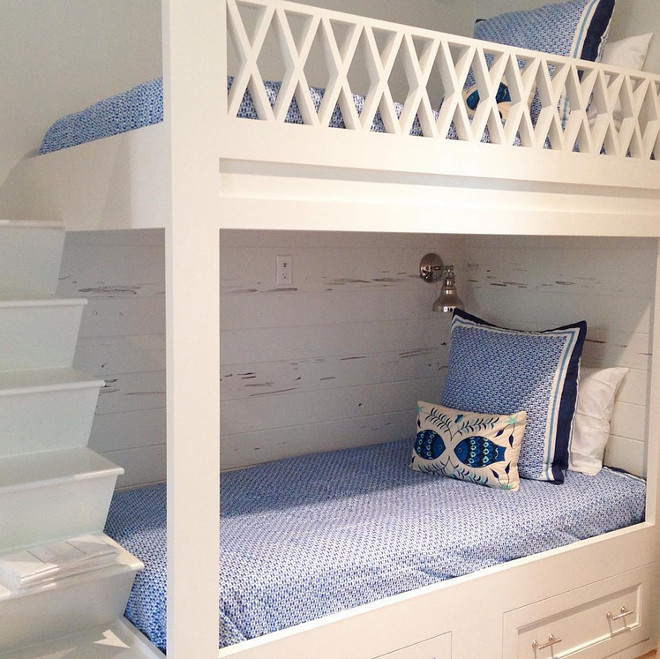 Bunk Bed Railing. Bunk Bed Railing Design. Bunk room with custom bunk beds with x railing, built in ladder and pecky cypress shiplap wall paneling. #BunkBed #Railing #BunkBedRailing #BunkBedRailingDesign #Bunkroom #custombunkbeds #xrailing #builtinladder Old Seagrove Homes.