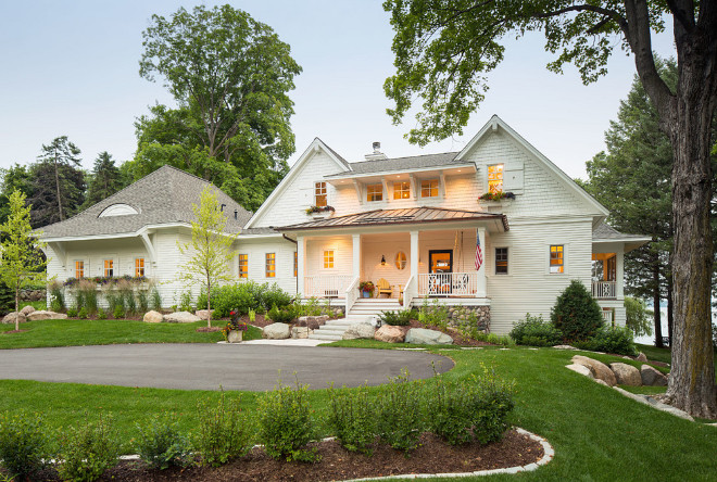 Cream white home exterior. The exterior of this home combines off white, cream white siding, metal roof and grey shingle roof. Cream white home exterior. The exterior of this home combines off white, cream white siding, metal roof and grey shingle roof #Creamwhitehomeexterior #homeexterior Sharratt Design & Company