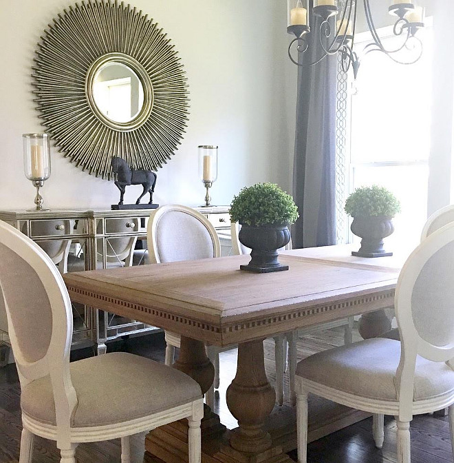Dining Room Decor. Farmhouse dining room decor. Table and chairs are from Restoration Hardware. Mirrored Buffet and Mirror: Zgallerie. Boxwoods & Candle Holders: Homegoods. Farmhouse dining room decor ideas #DiningRoom #Decor #Farmhouse #diningroomdecor #Farmhousediningroom #farmhousedecor #farmhousedecorideas Beautiful Homes of Instagram: classicstylehome