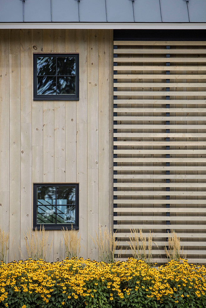 Farmhouse Exterior with Tongue and Groove Paneling and wood slats. Roundtree Construction. TruexCullins Architecture + Interior Design 