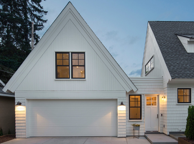 Garage Design. White garage with enclosed breezeway, barn light sconces, bonus room above garage and black steel windows. #GarageDesign #Whitegarage #enclosedbreezeway #garagebreezeway #breezeway #barnlightsconces #bonusroomabovegarage #garageblacksteelwindows #blacksteelwindows Keller Architecture.