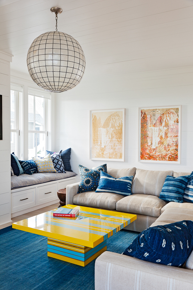 Globe pendant light. This kid's family room is all about color and that outrageously gorgeous capiz shell globe pendant. Large globe pendant light. Globe pendant light ideas #globependantlight Beau Clowney Architects. Jenny Keenan Design