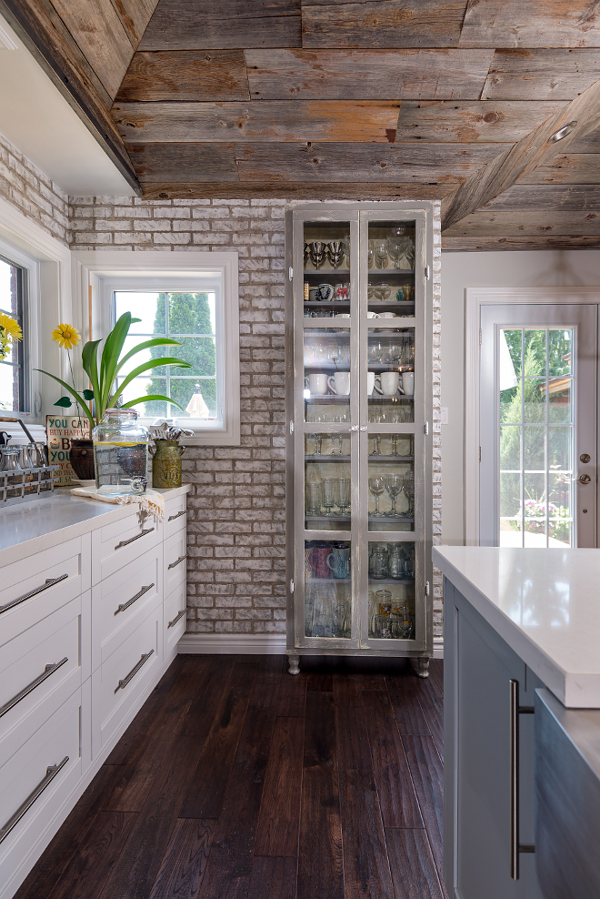 Ikea Cabinet Painted and Distressed to give it a farmhouse look. The homeowner saved some serious money by distressing this inexpensive Ikea cabinet, giving it an antique patina. The contractor bolted it to the wall to make it look embedded in the brick. #Ikea #Ikeatransformations #Ikeacabinet #farmhouse #Paintedcabninet Hardcore Renos