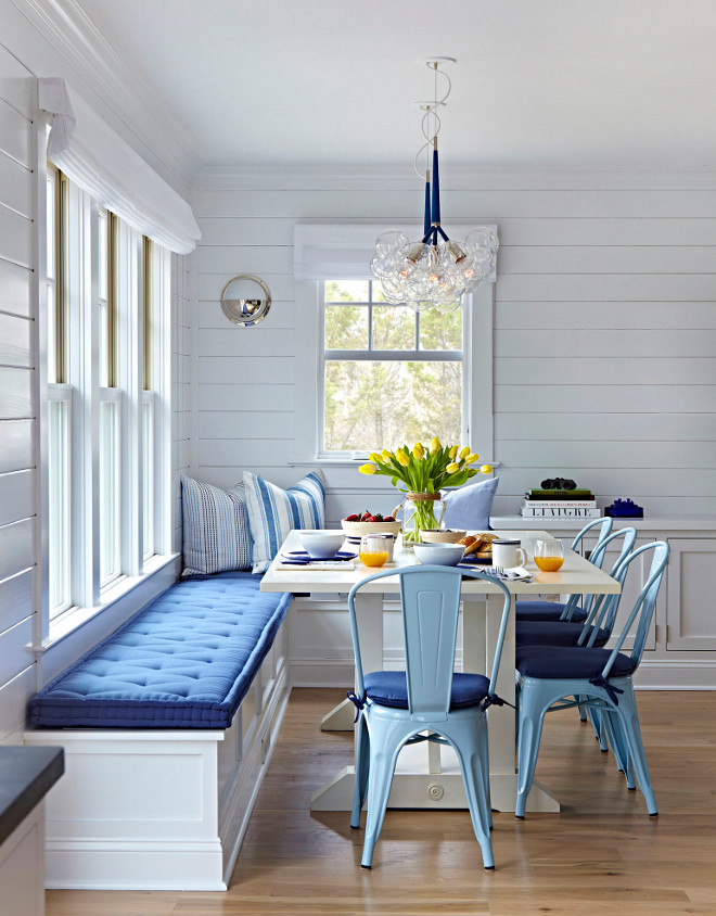 Kitchen Nook Banquette. This, once unused corner, became the perfect space for a kitchen nook with custom banquette. Kitchen Nook Banquette Ideas. Modern Kitchen Nook Banquette with Shiplap Walls. Buble Chandelier is Pelle Bubble Chandelier. #KitchenNookBanquette #KitchenNook #Banquette #NookBanquette Chango & Co.