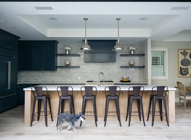 Navy kitchen painted in Benjamin Moore Hale Navy. Open kitchen painted in navy paint color Benjamin Moore Hale Navy #Openkitchen #NavyKitchen #navypaintcolor #BenjaminMooreHaleNavy Patterson Custom Homes