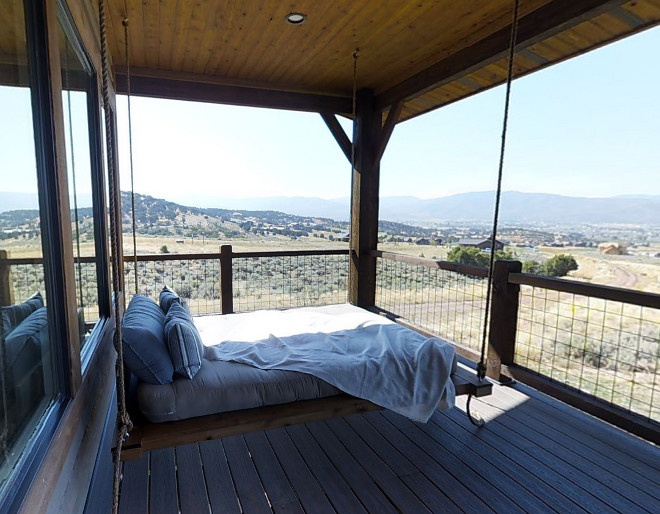 Porch swing daybed. The master bedroom opens to a balcony with a swing daybed. #swingdaybed Timberidge Custom Homes