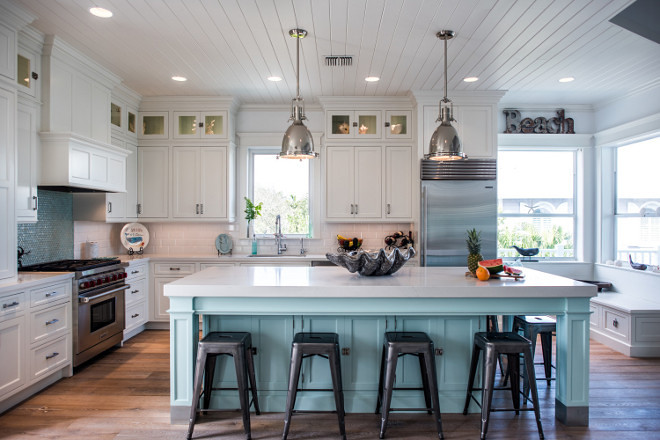 White kitchen with aqua island and tongue and groove ceiling boards. Wall paint color is "Benjamin Moore PM-1 Super White". Trim and ceiling pain color is "Benjamin Moore White Dove". Coastal White kitchen with aqua island and tongue and groove ceiling #Whitekitchen #aquaisland #tongueandgrooveceiling Tongue and groove ceiling paint color #Tongueandgrooveceiling #paintcolor Waterview Kitchens