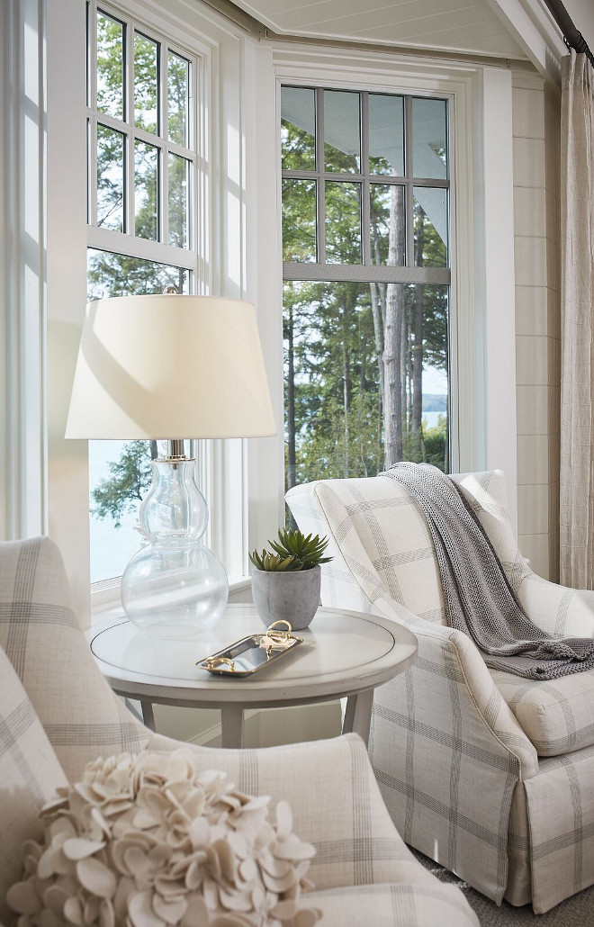 Bedroom seating area with two chairs and accent table. This lakeside bedroom seating area features two wingback chairs and pale gray accent table. Bedroom seating area with two chairs and accent table ideas. Bedroom seating area with two chairs and accent table design #Bedroomseatingarea #Bedroomchairs #Bedroomaccenttable Dwellings