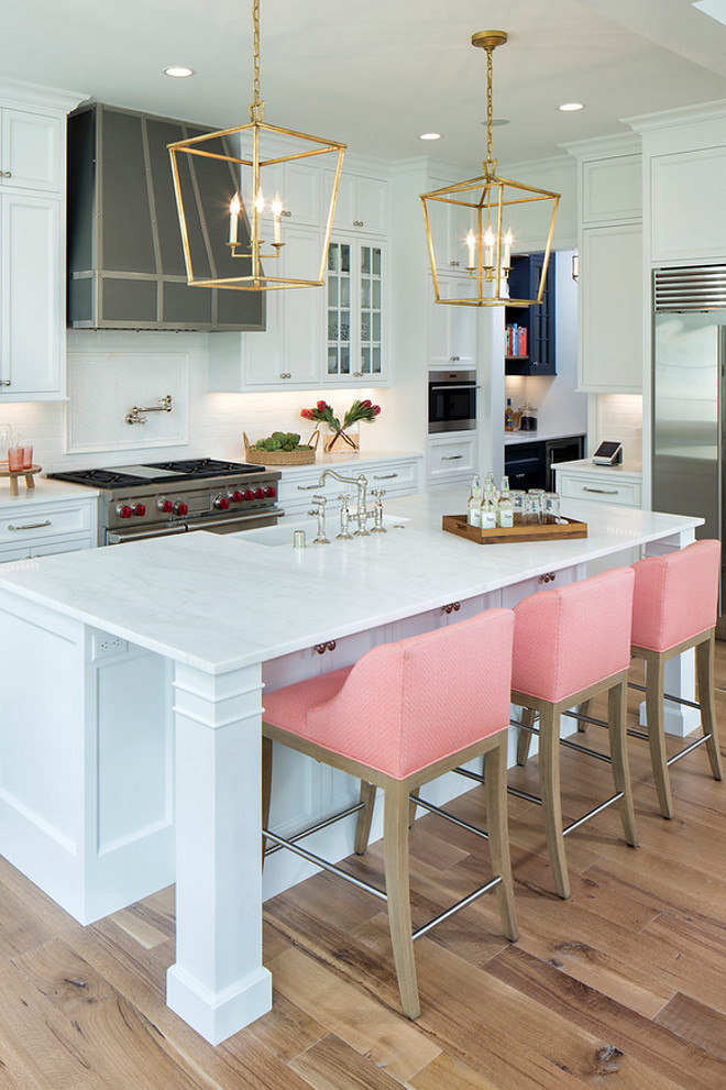 Bar stools. Barstools. Counterstool. These custom Jessica Charles Stools. The fabric is by Link Outdoor. The color is called Melon and the pattern is called Tidal. Martha O'Hara Interiors. John Kraemer & Sons