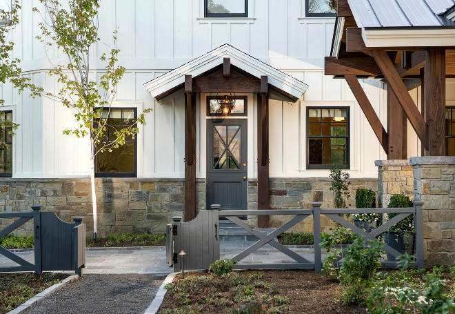 Farmhouse front door. Farmhouse with board and batten and stone exterior. Farmhouse Fence. #Farmhouse #frontdoor #FarmhouseDoor #FarmhouseFrontdoor #boardandbatten #stoneexterior #Farmhouse #Fence Jackson and LeRoy