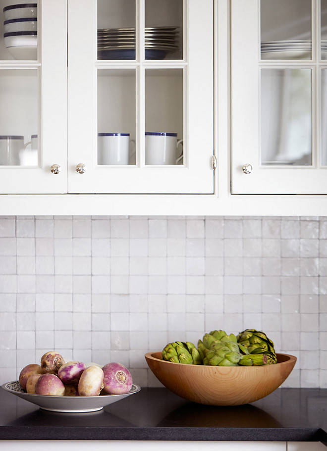 Kitchen Backsplash. The backsplash is 2x2 squares glazed tiles to look like mother of pearl, made of reclaimed bricks from Mosaic House. Kitchen handmade backsplash tile. White backsplash tile #Kitchen #handmadebacksplashtile #backsplashtile #backsplash #tile Andrew Howard Interior Design