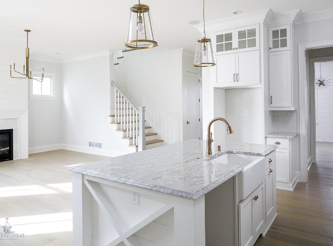 Open concept kitchen and family room lighting. Kitchen and family room lighting is from Crate and Barrel #CrateandBarrel #lighting #openconcept #kitchenlighting #familyroomkitchen Built by Artisan Signature Homes. Interior Design by Gretchen Black from Greyhouse Design.