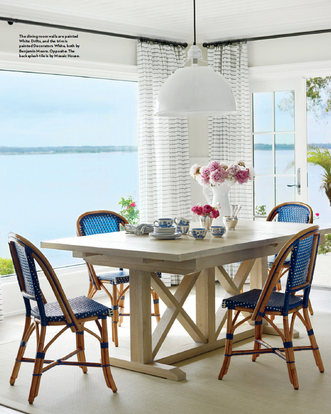 The dining room wall paint color is Benjamin Moore White Drifts. Trim paint color is Benjamin Moore Decorator's White. Andrew Howard Interior Design