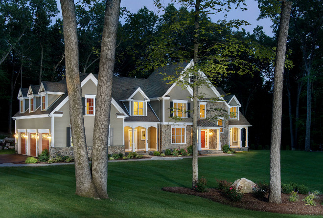 The trim color of this home is white, the siding color is James Hardie Woodstock Brown, and the garage doors are by Wayne Dalton 9800 series in mahogany color.