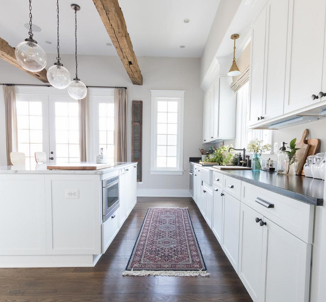 Vintage Kitchen Runner. White Farmhouse Kitchen with Vintage Kitchen Runner. The kitchen runner is from Salvation Army- thrifted! Vintage Kitchen Runner #VintageKitchenRunner #VintageRunner #KitchenRunner #Farmhousekitchenrunner #Farmhousekitchen Beautiful Homes of Instagram @greensprucedesigns