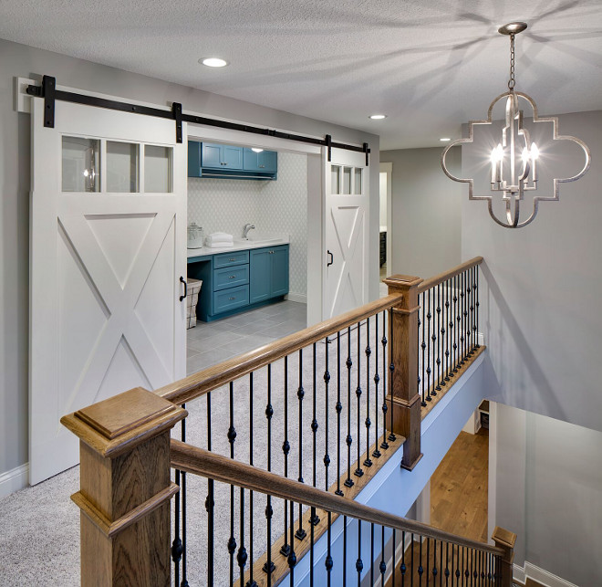 2nd floor laundry room with barn doors, Wall paint color is Benjamin Moore Silver Chain and barn doors are Benjamin Moore White Dove 2nd floor laundry room with barn door ideas, 2nd floor laundry room with barn door layout #2ndfloorlaundryroom #laundryroombarndoor #laundryroombarndoor #laundryroombarndoorideas #laundryroom #barndoors Grace Hill Design