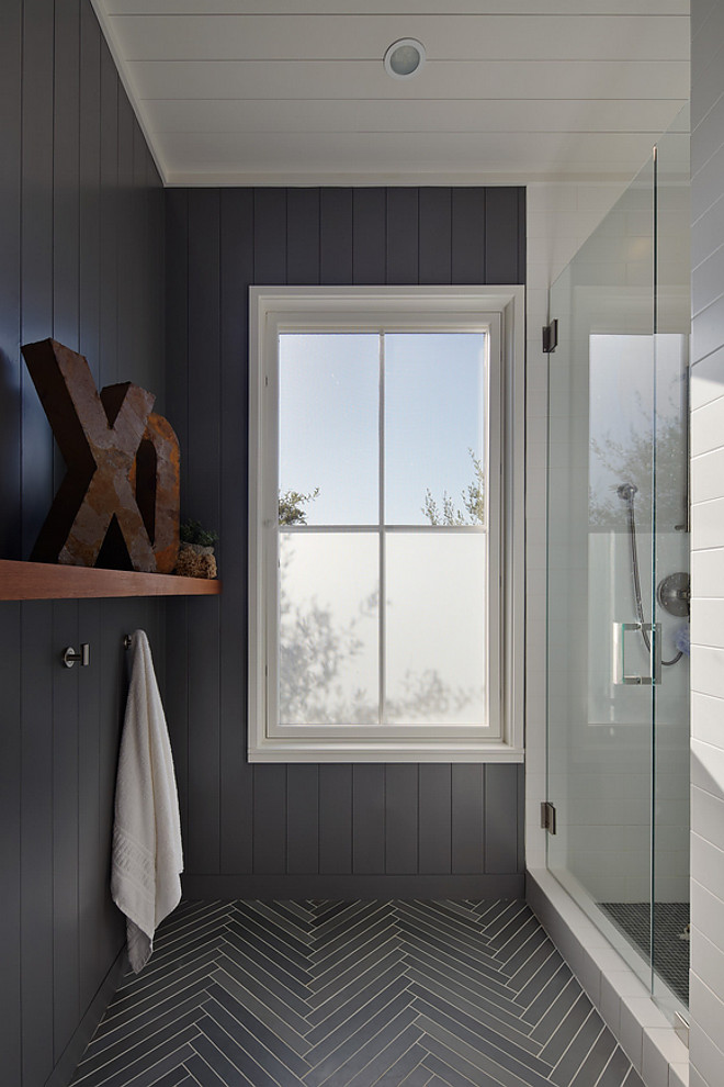 Bathroom vertical shiplap and limestone herringbone tile. The tiles are about 1 1/4"x 12" each. Paint color is Benjamin Moore Graphite. Bathroom vertical shiplap and limestone herringbone tile. Bathroom vertical shiplap and limestone herringbone tile. Bathroom vertical shiplap and limestone herringbone tile #Bathroom #verticalshiplap #shiplap #limestonetile #herringbonetile Nick Noyes Architecture