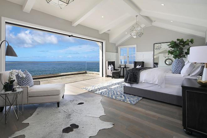 Bedroom folding doors -Beach house master bedroom with folding patio doors- Bedroom folding door ideas- Bedroom folding doors #Bedroom #foldingdoors #Patiofoldingdoors Brandon Architects, Inc