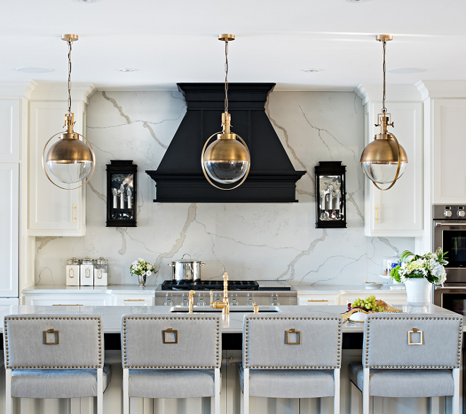 Brass Kitchen Lighting. Kitchen features brass and glass orb pendants. Brass Kitchen Lighting. Kitchen with brass lighting. Kitchen with brass lighting #Kitchen #brasslighting #kitchenlighting #lighting #Kitchen #brass #glass #orbpendants Sarah St. Amand Interior Design, Inc