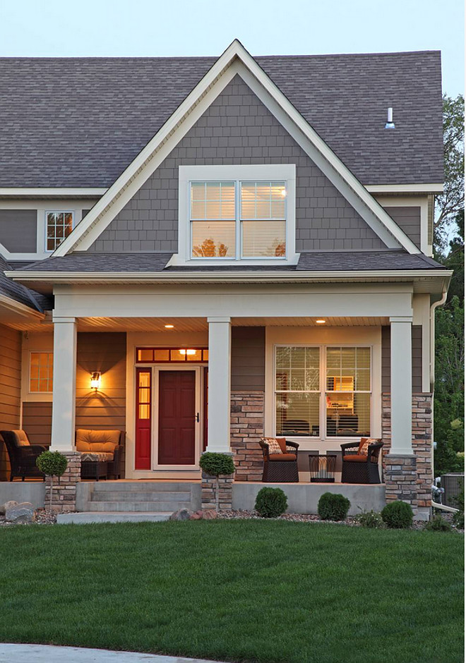 Exterior Siding, Trim Paint Color and Stone, The siding is James Hardie 40-30 Timberbark and the trim color is James Hardie 20-10 Sail Cloth, The stone is from Boulder Creek and the color used is Prairie Stone, is 50% Lancer, 50% Newbury, The roof is Oakridge Shingles - Color Drift Wood, The shingles are asphalt, the siding is Hardi board (masonry composite), Front door paint color is Benjamin Moore Heritage Red #exterior #homeexterior #siding #jameshardie #sidingcolor #trimcolor #stone #roof #homes Ridge Creek Custom Homes