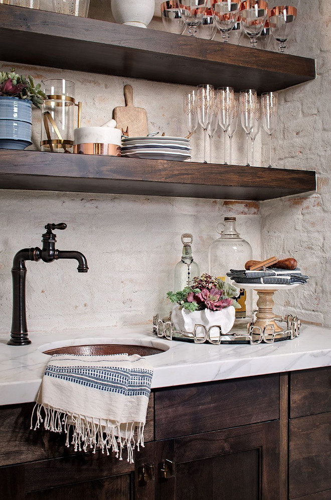 Farmhouse Butler's Pantry. Farmhouse Butler's Pantry with dark cabinets, white marble countertop and painted brick backsplash. Farmhouse Butler's pantry #FarmhouseButlerspantry #Farmhouse #Butlerspantry Tracy Lynn Studio