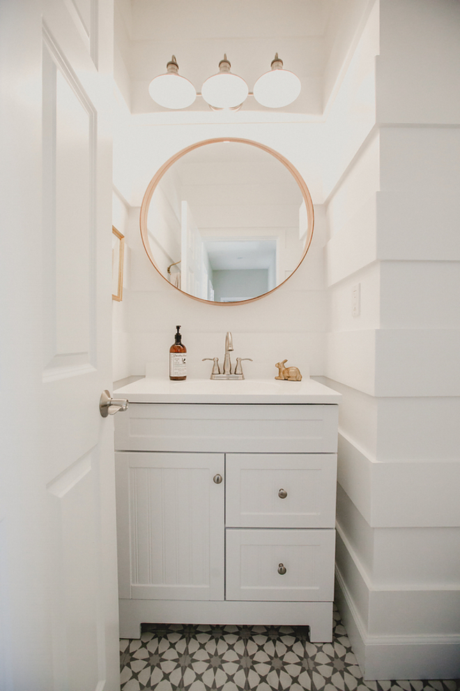 Farmhouse Bathroom Paneling, We did a different version of shiplap and put in a fun cement tile from the Cement Tile Shop, Paint- Extra White Sherwin Williams Farmhouse Bathroom Paneling, Farmhouse Bathroom Wall Paneling, Farmhouse Bathroom Wall Paneling Ideas #FarmhouseBathroomWallPaneling #Farmhouse #BathroomWallPaneling #Farmhousebathroom Beautiful Homes of Instagram @house.becomes.home