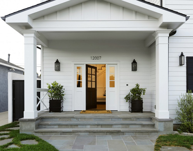 Front Porch. Cape Cod Home with Pediment style porch. Modern Cape Cod Home with Pediment style porch. Modern Cape Cod home with pediment style porch and Bluestone walkway #ModernCapeCod #capecodhome #pedimentstyleporch #porch #Bluestone #stonewalkway Hamilton Architects