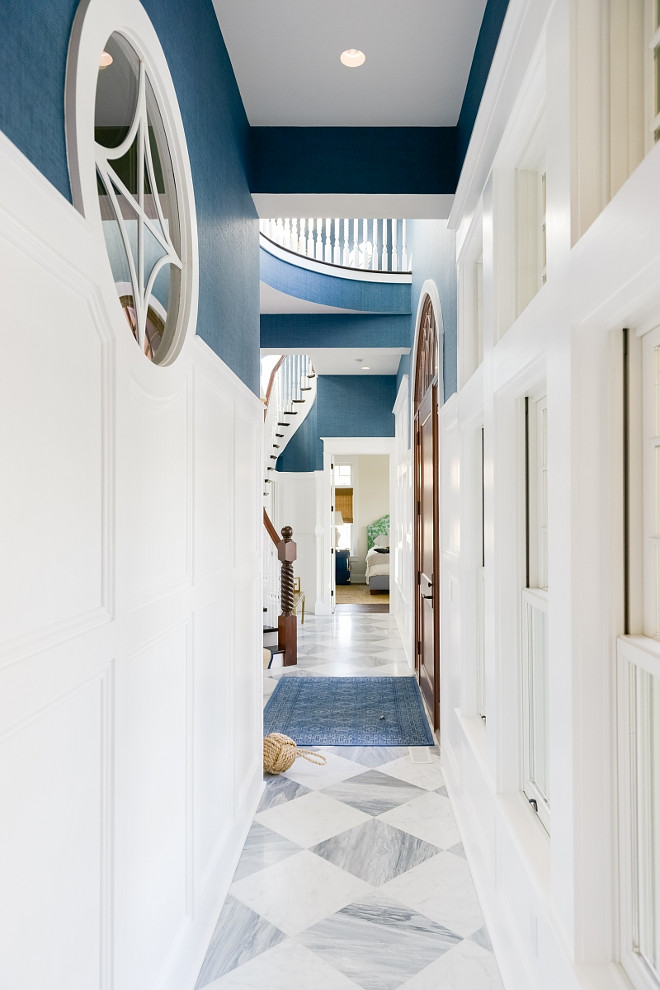 Hallway Millwork. Hallway with classic wall paneling and Thibaut wallpaper #Thibaut #wallpaper #millwork #hallway Echelon Custom Homes