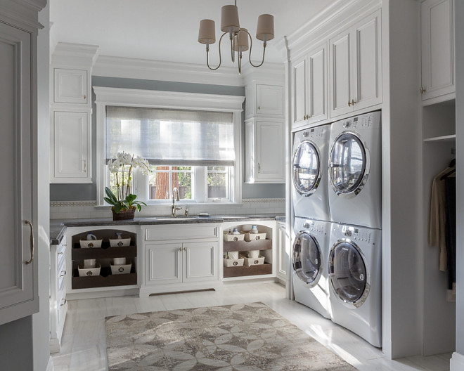 Laundry room with with stacked double washer and dryer, laundry chute and floor to ceiling cabinets, Large Laundry room with with stacked double washer and dryer, laundry chute and floor to ceiling cabinets #Laundryroom #Largelaundryroom #stackeddoublewasheranddryer #stackedwasheranddryer #doublewasheranddryer #laundrychute #cabinets Spectrum Interior Design, Inc