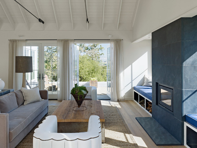 Living room French Doors. The French doors are are Marvin Clad Doors. Hardwood floor is Mirage Isla White Oak. The fireplace stone is slabs of black slate. Living room French Door. Living room French Door Ideas. Living room French Doors #Livingroom #FrenchDoors #LivingroomFrenchDoors Nick Noyes Architecture