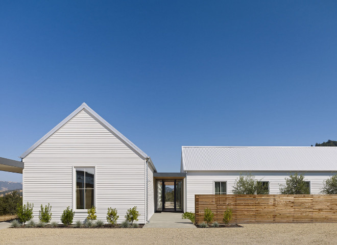 Modern Farmhouse Siding. Modern Farmhouse Siding Ideas. Hardie Board lap siding - square edge - primed. The metal roof is called corrugated Galvalume - it is better that standard sheet metal - it will last for a long time - excellent roof. Windows are all Marvin casement windows - clad on the exterior with wood on the interiors. #ModernFarmhouseSiding #ModernFarmhouse #Siding #ModernFarmhouseSidingIdeas #HardieBoard #lapsiding #squareedgesiding Nick Noyes Architecture